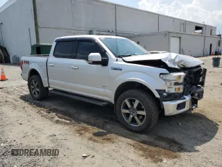2015 Ford F-150 XLT with VIN 1FTEW1EGXFFC48357, listed as a Copart auction lot 59607485 with 199,050 mi miles and Salvage title. Bid and sale history available at DreamBid. Image 4.