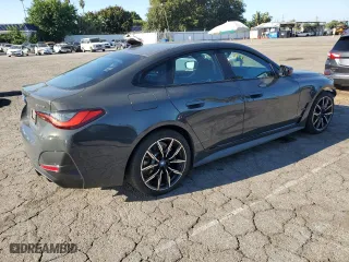 2023 BMW i4 eDrive40 with VIN WBY73AW08PFN97116, listed as a Copart auction lot 67344213 with 12,299 mi miles. Bid and sale history available at carsss.com. Image 3.