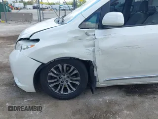 2016 Toyota Sienna XLE with VIN 5TDYK3DC4GS702638, listed as a IAAI auction lot 42255793 with 124,977 mi miles and . Bid and sale history available at DreamBid. Image 6.