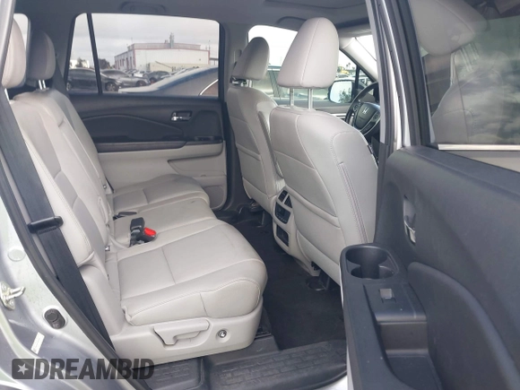 2016 Honda Pilot EX-L with VIN 5FNYF5H57GB038349, listed as a IAAI auction lot 41378569 with 117,651 mi miles and . Bid and sale history available at DreamBid. Image 8.
