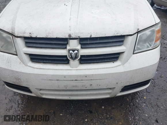 2009 Dodge Grand Caravan SE z VIN 2D8HN44E59R686932, wystawiony jako IAAI lot #41980994 z przebiegiem Nie podano mil oraz . Historia ofert i sprzedaży dostępna na DreamBid. Obrazek 6.
