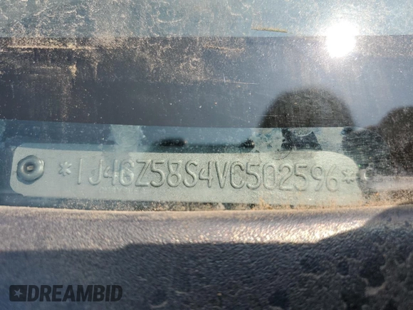 1997 Jeep Grand Cherokee Laredo z VIN 1J4GZ58S4VC502596, wystawiony jako Copart lot #88255865 z przebiegiem Nie podano mil oraz Nie do naprawy • Non repairable. Historia ofert i sprzedaży dostępna na DreamBid. Obrazek 12.