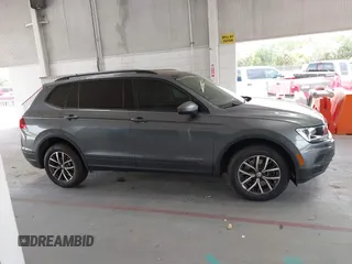 2021 Volkswagen Tiguan S z VIN 3VV1B7AX0MM030915, wystawiony jako IAAI lot #42198262 z przebiegiem 47 500 mil mil oraz . Historia ofert i sprzedaży dostępna na DreamBid. Obrazek 13.