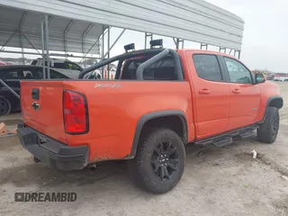 2019 Chevrolet Colorado 4WD ZR2 z VIN 1GCGTEEN9K1333740, wystawiony jako IAAI lot #41565621 z przebiegiem 71 484 mil mil oraz . Historia ofert i sprzedaży dostępna na DreamBid. Obrazek 4.