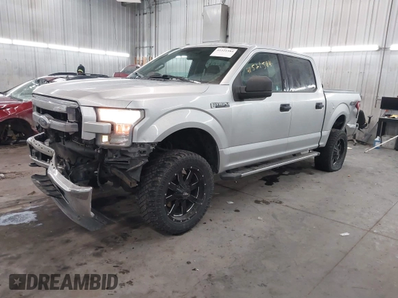2015 Ford F-150 XLT with VIN 1FTEW1E89FFA44710, listed as a IAAI auction lot 41521584 with 158,297 mi miles. Bid and sale history available at carsss.com. Image 2.