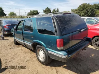 1996 GMC Jimmy SL with VIN 1GKCS13W0T2553905, listed as a Copart auction lot 71007674 with 169,513 mi miles and Salvage Title. Bid and sale history available at carsss.com. Image 2.