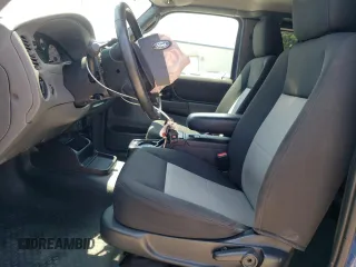 2011 Ford Ranger XLT with VIN 1FTLR4FE5BPA70682, listed as a Copart auction lot 62114555 with 58,319 mi miles and Salvage title. Bid and sale history available at DreamBid. Image 7.