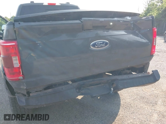 2021 Ford F-150 XL with VIN 1FTFW1E85MKD35973, listed as a IAAI auction lot 42381874 with 57,982 mi miles and . Bid and sale history available at DreamBid. Image 6.