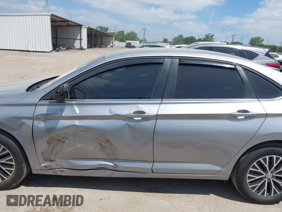 2021 Volkswagen Jetta S z VIN 3VWC57BU9MM015930, wystawiony jako IAAI lot #42020727 z przebiegiem 67 982 mil mil oraz . Historia ofert i sprzedaży dostępna na DreamBid. Obrazek 14.