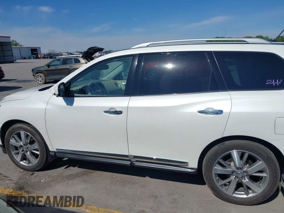 2015 Nissan Pathfinder SL with VIN 5N1AR2MM4FC707351, listed as a IAAI auction lot 42334235 with 124,017 mi miles and . Bid and sale history available at DreamBid. Image 14.