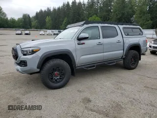 2017 Toyota Tacoma SR5 with VIN 5TFCZ5AN3HX088281, listed as a Copart auction lot 57180965 with 100,065 mi miles and Salvage title. Bid and sale history available at DreamBid. Image 1.