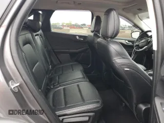 2021 Ford Escape SEL с VIN 1FMCU0H6XMUA27890, выставлен на аукционе Copart как лот 55490645 с пробегом 35 067 миль миль и Списание • Salvage title. История ставок и продаж доступна на DreamBid. Изображение 10.