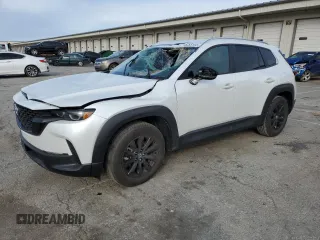 2025 Mazda CX-50 S Preferred с VIN 7MMVABBM8SN334118, выставлен на аукционе Copart как лот 52557405 с пробегом 1 086 миль миль и Списание • Salvage title. История ставок и продаж доступна на DreamBid. Изображение 1.