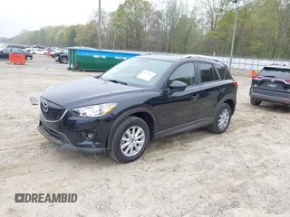 2014 Mazda CX-5 Touring with VIN JM3KE2CY7E0341658, listed as a IAAI auction lot 41915807 with 99,287 mi miles. Bid and sale history available at carsss.com. Image 18.