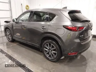 2017 Mazda CX-5 Grand Touring with VIN JM3KFADLXH0151593, listed as a IAAI auction lot 41823378 with 149,299 mi miles. Bid and sale history available at carsss.com. Image 3.