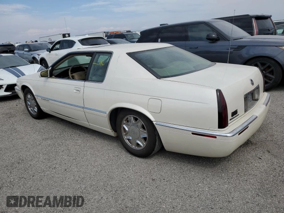 1999 Cadillac Eldorado z VIN 1G6EL12Y7XU615169, wystawiony jako Copart lot #76459744 z przebiegiem Nie podano mil oraz Szkoda całkowita • Salvage title. Historia ofert i sprzedaży dostępna na DreamBid. Obrazek 2.