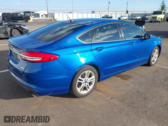 2018 Ford Fusion SE with VIN 3FA6P0HDXJR168152, listed as a IAAI auction lot 41740165 with 129,636 mi miles. Bid and sale history available at carsss.com. Image 4.
