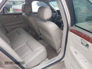 2006 Cadillac DTS 1SC z VIN 1G6KD57Y56U102470, wystawiony jako IAAI lot #40758530 z przebiegiem 149 330 mil mil oraz . Historia ofert i sprzedaży dostępna na DreamBid. Obrazek 8.