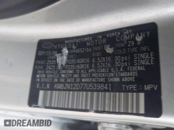 2007 Hyundai Tucson SE with VIN KM8JN12D77U539841, listed as a IAAI auction lot 41777599 with 126,958 mi miles. Bid and sale history available at carsss.com. Image 9.