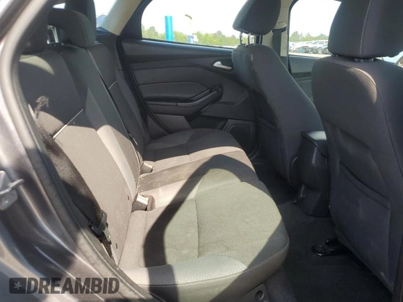 2014 Ford Focus SE z VIN 1FADP3K28EL104745, wystawiony jako Copart lot #54496215 z przebiegiem 154 565 mil mil oraz Szkoda całkowita • Salvage title. Historia ofert i sprzedaży dostępna na DreamBid. Obrazek 10.