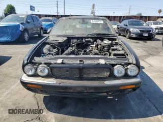 2003 Jaguar XJ with VIN SAJDA15B63MF52618, listed as a Copart auction lot 64336415 with Not provided miles and Clean title. Bid and sale history available at DreamBid. Image 5.