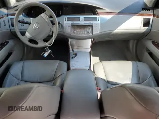 2010 Toyota Avalon XL with VIN 4T1BK3DB3AU357047, listed as a Copart auction lot 52694255 with 130,749 mi miles and Salvage Title. Bid and sale history available at carsss.com. Image 8.