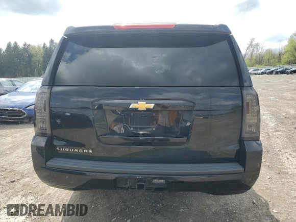 2015 Chevrolet Suburban LT with VIN 1GNSKJKC9FR510682, listed as a Copart auction lot 55427315 with 202,592 mi miles and Salvage Title. Bid and sale history available at DreamBid. Image 6.