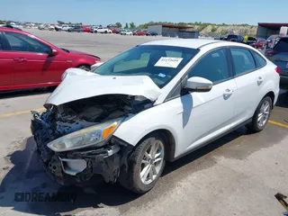 2016 Ford Focus SE z VIN 1FADP3F23GL338496, wystawiony jako IAAI lot #42333608 z przebiegiem 76 972 mil mil oraz . Historia ofert i sprzedaży dostępna na DreamBid. Obrazek 18.