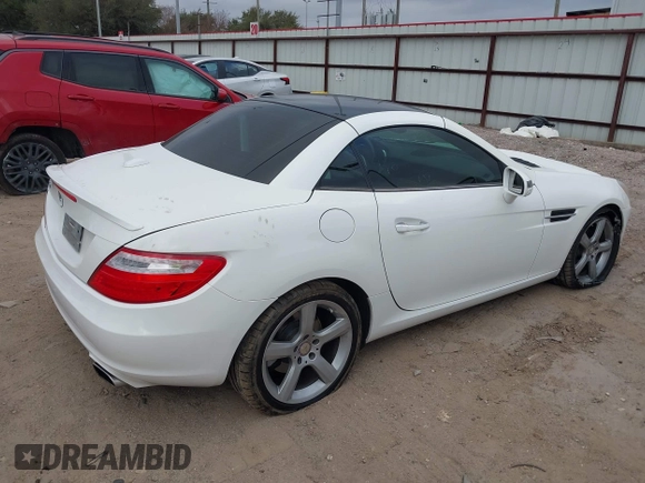 2014 Mercedes-Benz SLK 250 with VIN WDDPK4HA7EF081313, listed as a IAAI auction lot 41520329 with 53,031 mi miles and . Bid and sale history available at DreamBid. Image 4.
