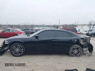 2019 Dodge Charger SXT with VIN 2C3CDXJG7KH757728, listed as a IAAI auction lot 41797017 with 68,063 mi miles and . Bid and sale history available at DreamBid. Image 13.