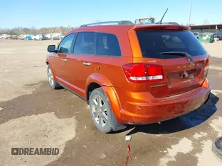 2014 Dodge Journey American Value Pkg with VIN 3C4PDCAB9ET316642, listed as a IAAI auction lot 42050437 with 184,742 mi miles. Bid and sale history available at carsss.com. Image 3.