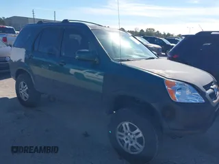 2002 Honda CR-V EX with VIN JHLRD78842C040973, listed as a IAAI auction lot 41214880 with 153,429 mi miles and . Bid and sale history available at DreamBid. Image 1.