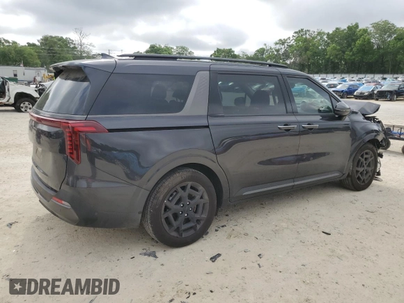 2025 Kia Carnival SX with VIN KNDNE5K37S6490478, listed as a Copart auction lot 51389565 with 6,929 mi miles and Salvage Title. Bid and sale history available at DreamBid. Image 3.