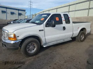 1999 Ford F-250 XL with VIN 1FTNX20S3XEB69666, listed as a Copart auction lot 49319215 with 99,366 mi miles and Salvage title. Bid and sale history available at DreamBid. Image 1.
