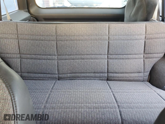 1999 Jeep Cherokee Sport with VIN 1J4FT68S6XL578679, listed as a Copart auction lot 76697394 with 196,110 mi miles and Salvage title. Bid and sale history available at DreamBid. Image 10.