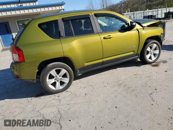 2012 Jeep Compass Latitude with VIN 1C4NJDEB6CD630669, listed as a Copart auction lot 52028235 with 124,123 mi miles and Salvage Title. Bid and sale history available at DreamBid. Image 3.