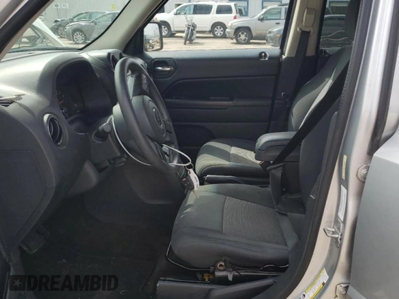 2013 Jeep Patriot Sport with VIN 1C4NJPBA9DD265273, listed as a Copart auction lot 52697955 with 154,472 mi miles and Salvage Title. Bid and sale history available at carsss.com. Image 7.