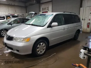 2004 Honda Odyssey EX-L with VIN 5FNRL189X4B098131, listed as a Copart auction lot 47294865 with 196,581 mi miles and Salvage Title. Bid and sale history available at DreamBid. Image 1.