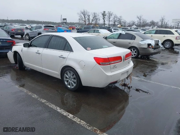 2012 Lincoln MKZ with VIN 3LNHL2JCXCR813912, listed as a IAAI auction lot 41560299 with 153,806 mi miles. Bid and sale history available at carsss.com. Image 3.