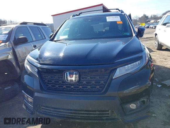 2019 Honda Passport Elite z VIN 5FNYF8H07KB014647, wystawiony jako IAAI lot #41544464 z przebiegiem 82 698 mil mil oraz . Historia ofert i sprzedaży dostępna na DreamBid. Obrazek 12.