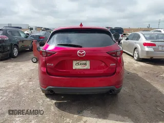 2018 Mazda CX-5 Grand Touring with VIN JM3KFADM7J1357401, listed as a IAAI auction lot 42106012 with 119,420 mi miles and . Bid and sale history available at DreamBid. Image 16.