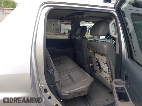 2012 Honda Ridgeline RTL with VIN 5FPYK1F58CB454385, listed as a IAAI auction lot 42212805 with 207,874 mi miles and . Bid and sale history available at DreamBid. Image 8.