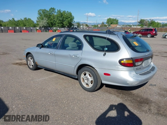 1996 Ford Taurus GL z VIN 1FALP57U9TG184497, wystawiony jako IAAI lot #42290105 z przebiegiem 149 155 mil mil oraz . Historia ofert i sprzedaży dostępna na DreamBid. Obrazek 3.