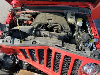 2020 Jeep Gladiator Sport S z VIN 1C6HJTAG4LL162110, wystawiony jako Copart lot #51546565 z przebiegiem 67 948 mil mil oraz Szkoda całkowita • Salvage title. Historia ofert i sprzedaży dostępna na DreamBid. Obrazek 11.