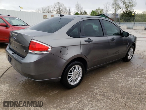 2010 Ford Focus SE with VIN 1FAHP3FN0AW153842, listed as a Copart auction lot 53556615 with 121,747 mi miles and Salvage Title. Bid and sale history available at carsss.com. Image 3.
