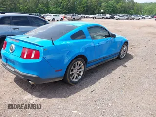 2010 Ford Mustang V6 with VIN 1ZVBP8AN0A5146767, listed as a IAAI auction lot 42121964 with 139,009 mi miles. Bid and sale history available at carsss.com. Image 4.