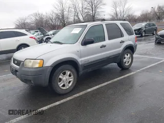 2002 Ford Escape XLT Choice with VIN 1FMYU04192KA82503, listed as a IAAI auction lot 41521335 with 128,349 mi miles. Bid and sale history available at carsss.com. Image 2.