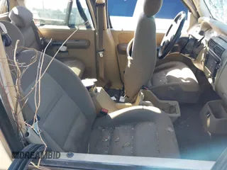 2004 Ford Explorer Sport Trac XLS z VIN 1FMZU67K74UC30067, wystawiony jako IAAI lot #41680436 z przebiegiem Nie podano mil oraz . Historia ofert i sprzedaży dostępna na DreamBid. Obrazek 5.