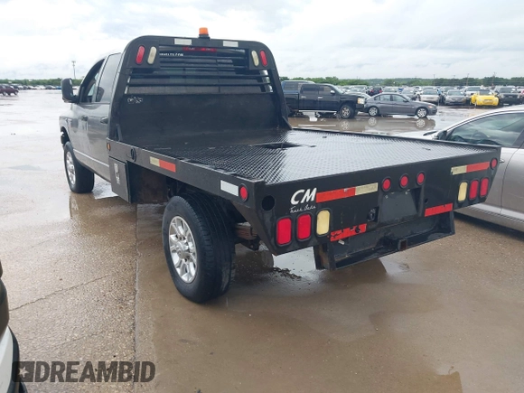 2009 Dodge Ram 2500 ST with VIN 3D7KS28LX9G550043, listed as a IAAI auction lot 42166803 with 291,899 mi miles. Bid and sale history available at carsss.com. Image 3.