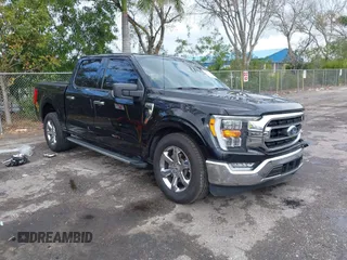 2021 Ford F-150 XL with VIN 1FTEW1CP7MKD20266, listed as a IAAI auction lot 41618910 with 80,194 mi miles. Bid and sale history available at carsss.com. Image 1.